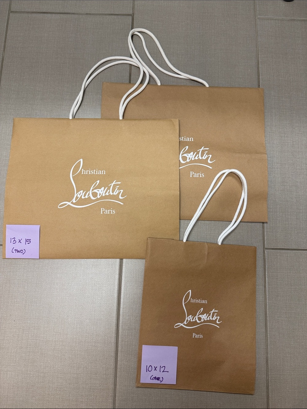 Christian Louboutin Brown Paper Tote Bags with White Logo and Handles